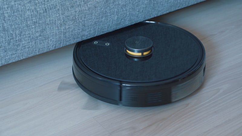 Robot Vacuum in Modern Living Room - Robot Vacuum Comparison Guide